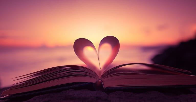 red heart and book